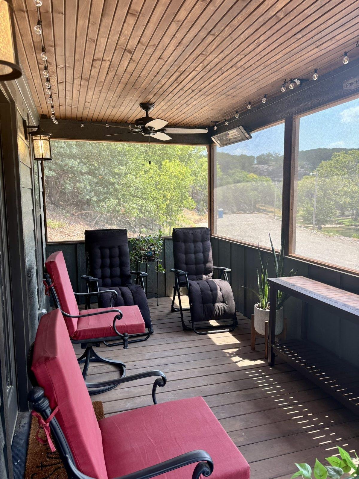 Table and chairs on the screened porch